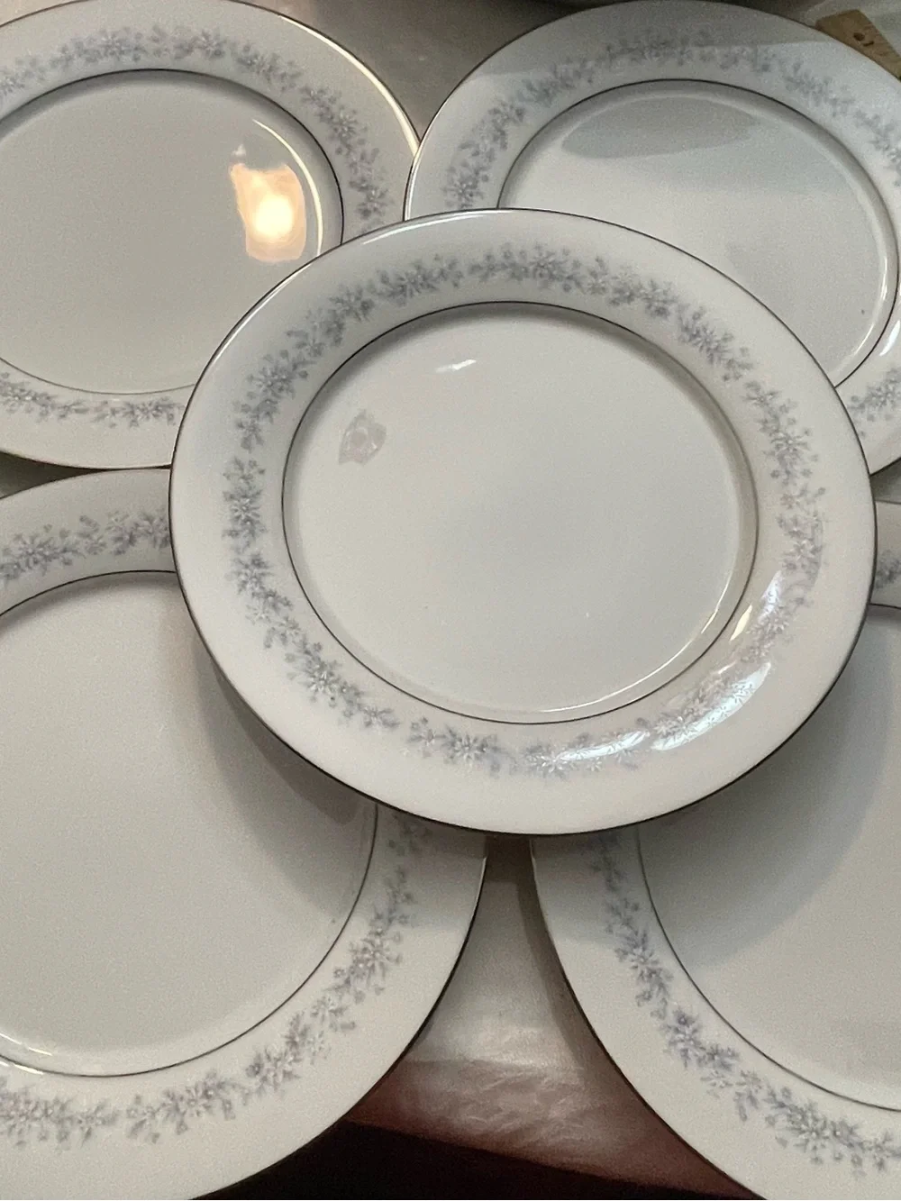Noritake White Dinner Plate with Pale Blue Floral and Silver Trim